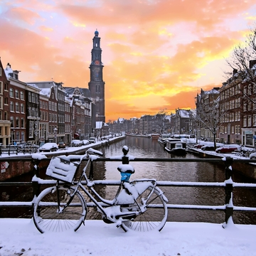 Westerkerk im winterlichen Amsterdam, Niederlande - © Nataraj - stock.adobe.com